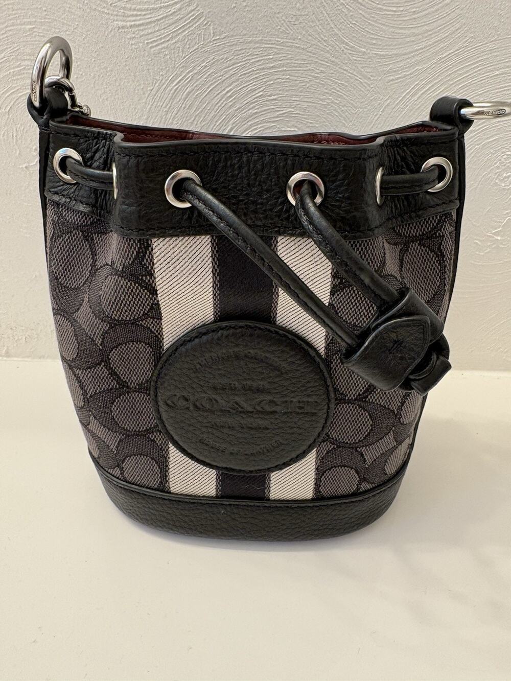 Coach Mini Dempsey Bucket Bag In Signature Jacquard Black With White Stripe